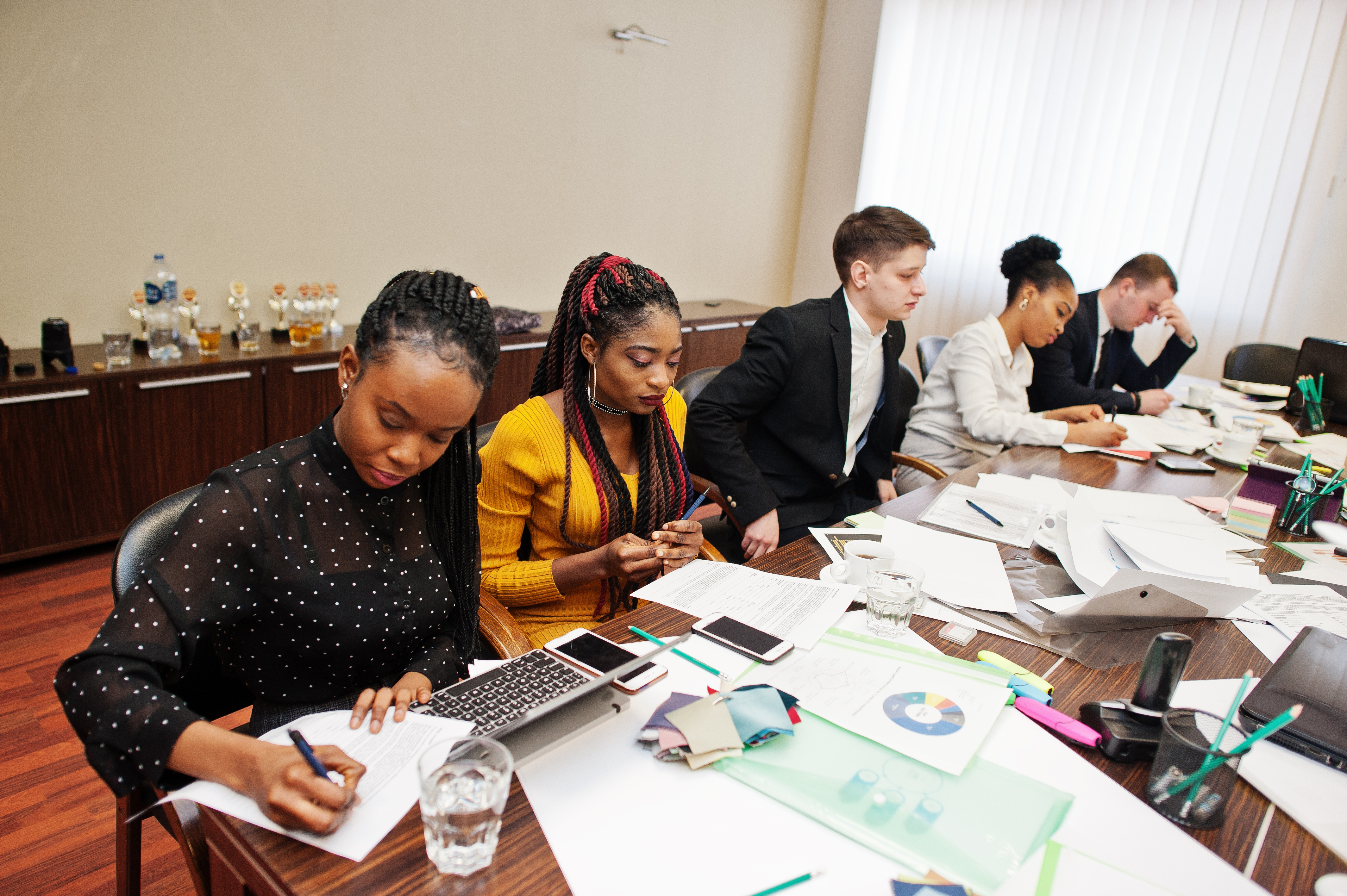 Multiracial team working together